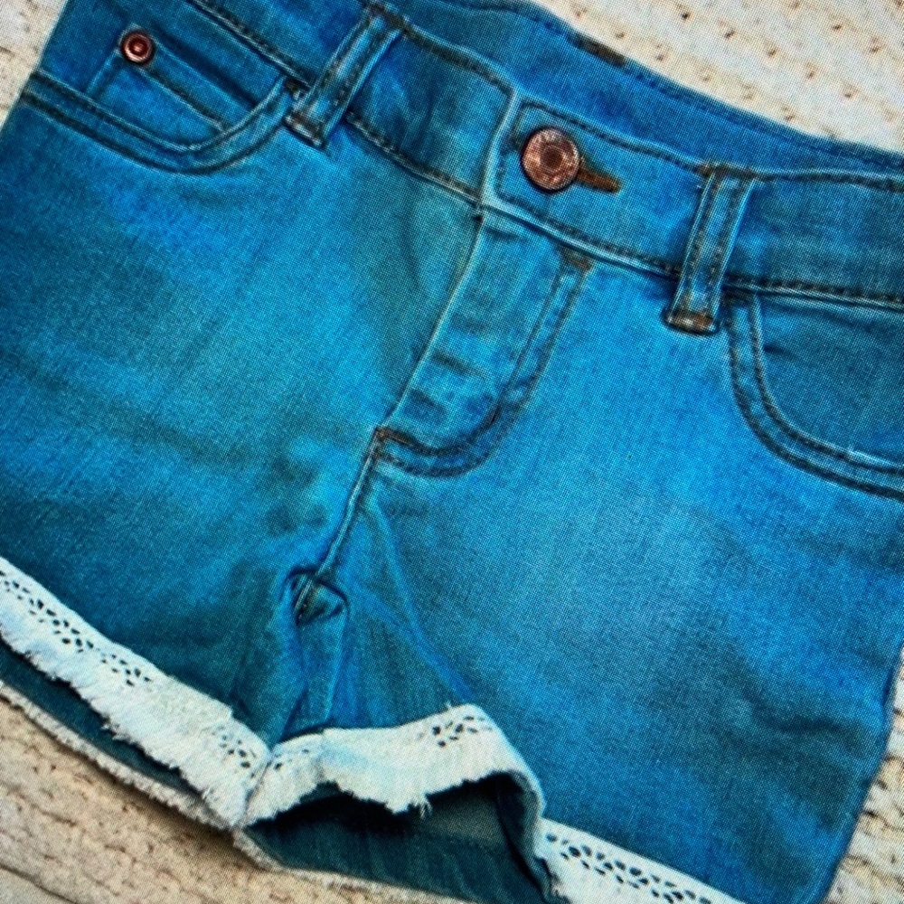 Stylish features playful denim shorts